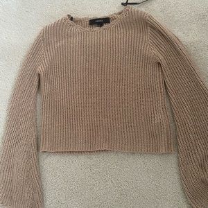 tan sweater